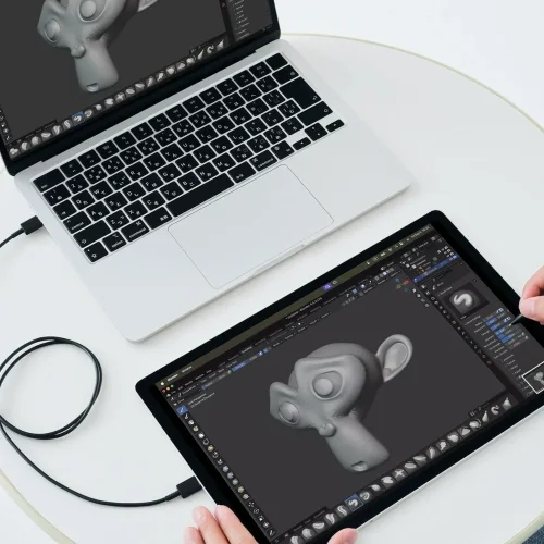 Wacom MovinkPad Pro 14 używany jako ekran piórkowy do komputera. Tablet graficzny OLED z piórkiem Pro Pen 3 do ilustracji, rysowania i modelowania 3D.